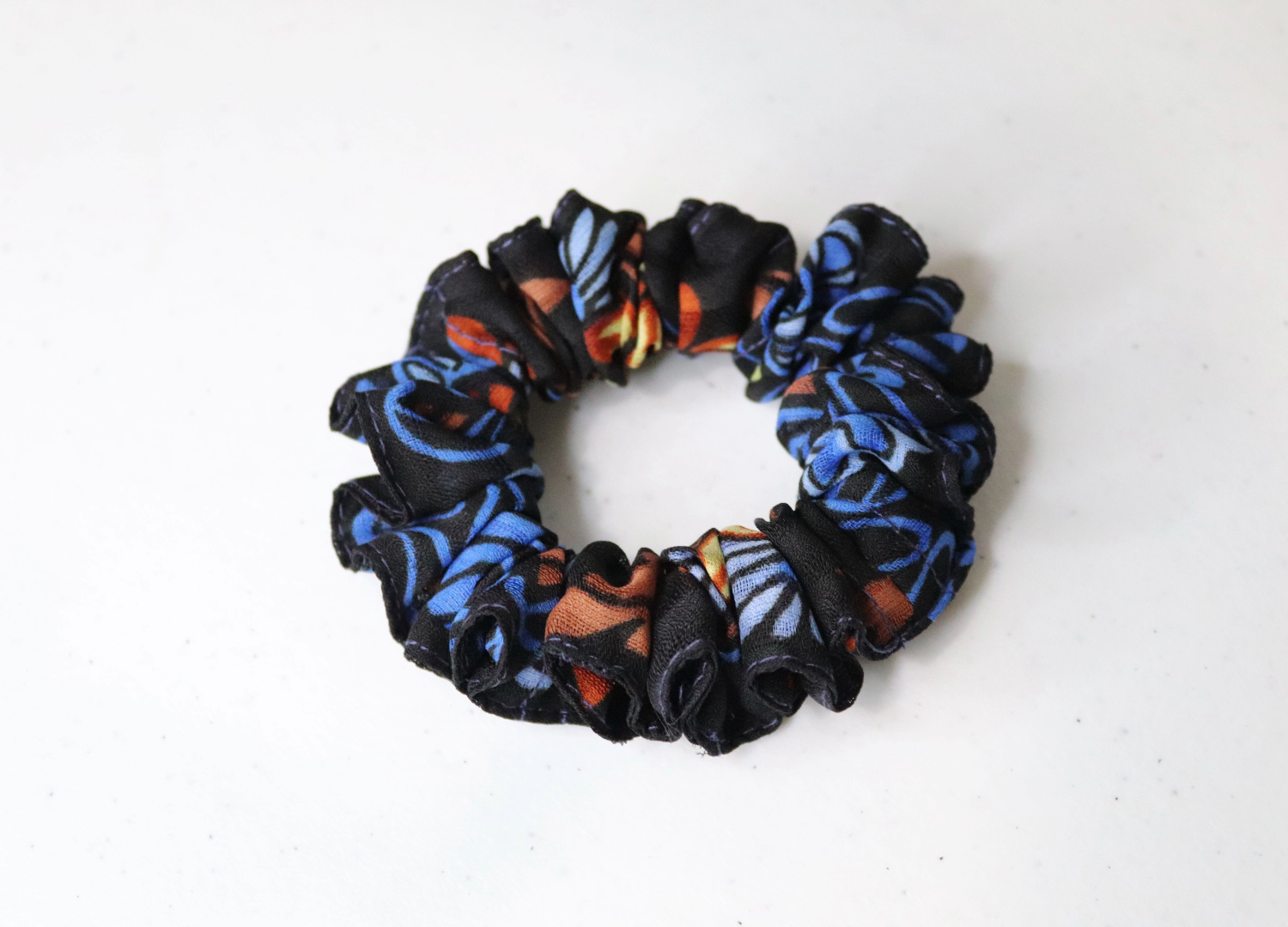 handmade hair scrunchie, floral scrunchie, black and blue