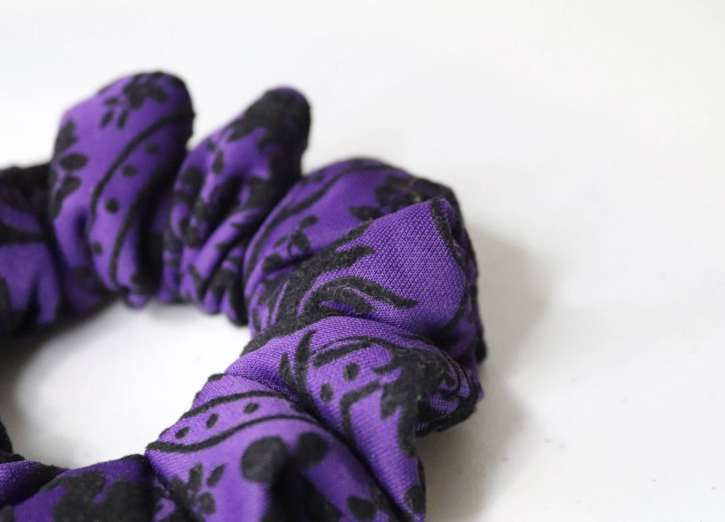 purple handmade hair scrunchie thick fabric close up